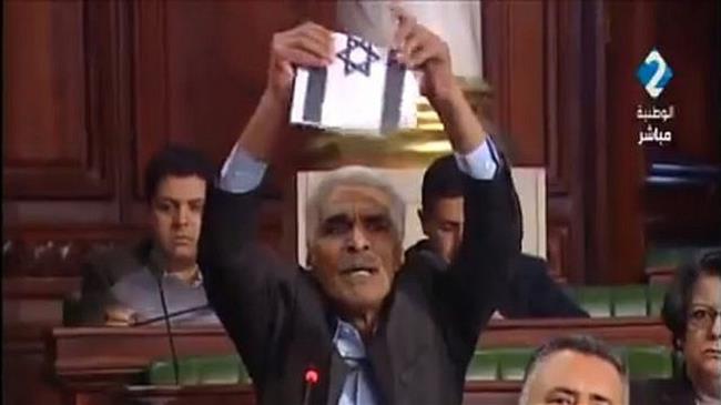 Tunisia MP rips up Israel flag to promote no-ties bill: Video