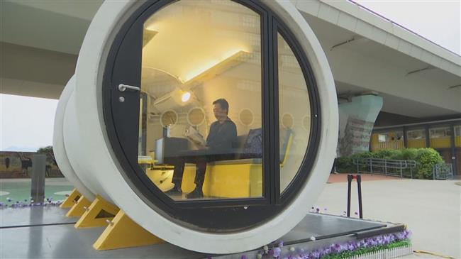 Micro-apartments in giant concrete drainage pipes