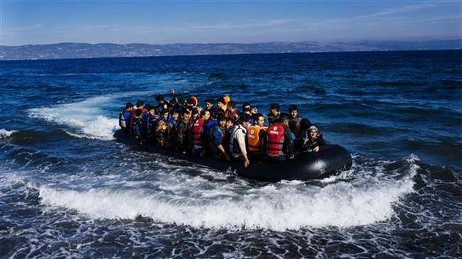 At least 14 dead as refugee boat sinks off Greek island