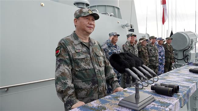 China’s Xi attends huge naval drill in South China Sea