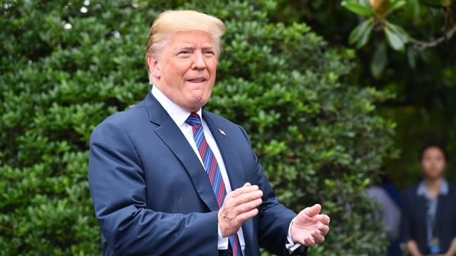 Trump, again, denies firing Comey over Russia probe