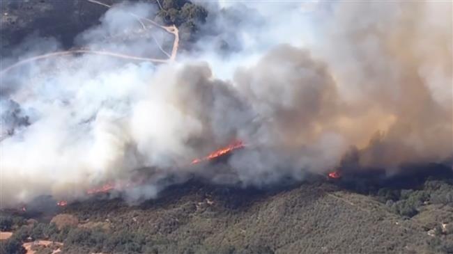 Brush fires force evacuations in California