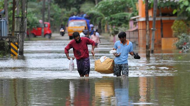 Death toll from floods in south India hits 445