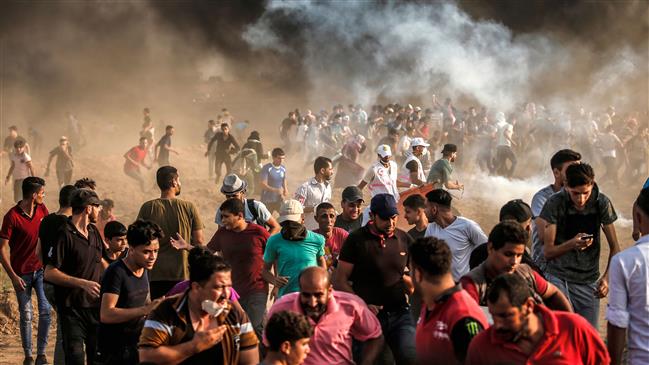 Palestinians in Gaza rally against the Israeli regime