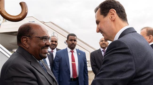 Sudan’s Bashir first Arab leader to visit Damascus in 8 years