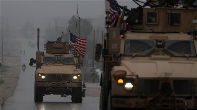 Trump defends withdrawing US troops from Syria
