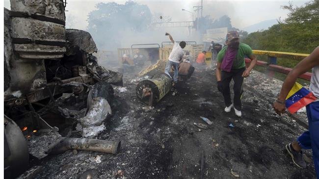 Anti-Maduro protester caught on camera setting US ‘aid’ truck on fire: NYT’s footage