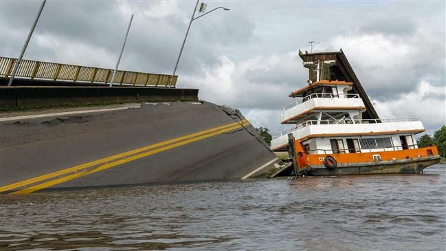 Bridge struck by boat collapses into river in northern Brazil Bridge struck by boat collapses into river in northern Brazil