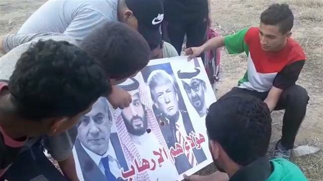 Gazan youths set fire to pictures of Arab ‘betrayers’