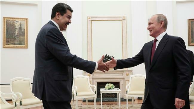 Putin, Maduro skip UN General Assembly, meet in Moscow